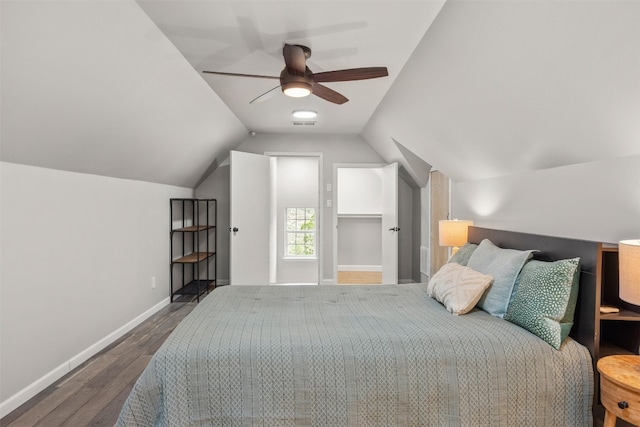 12099 Bonham Ranch Rd, Dripping Springs, TX 78620 - bedroom featuring wood finished floors, baseboards, vaulted ceiling, and a ceiling fan
