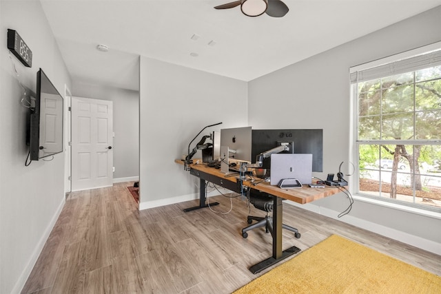 12099 Bonham Ranch Rd, Dripping Springs, TX 78620 - office area featuring wood finished floors, baseboards, and a ceiling fan