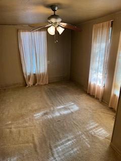 109 Tennessee St, Taylor, TX 76574 - empty room with a ceiling fan