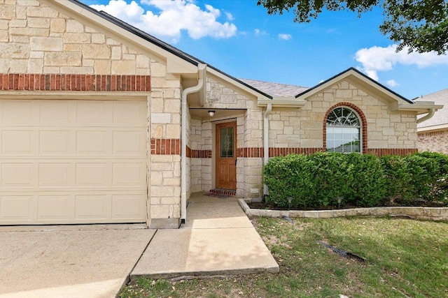 1901 Rachel Ln, Round Rock, TX 78664 - view of front of house featuring stone siding and an attached garage