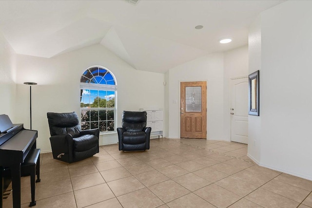 1901 Rachel Ln, Round Rock, TX 78664 - living area with lofted ceiling and light tile patterned floors