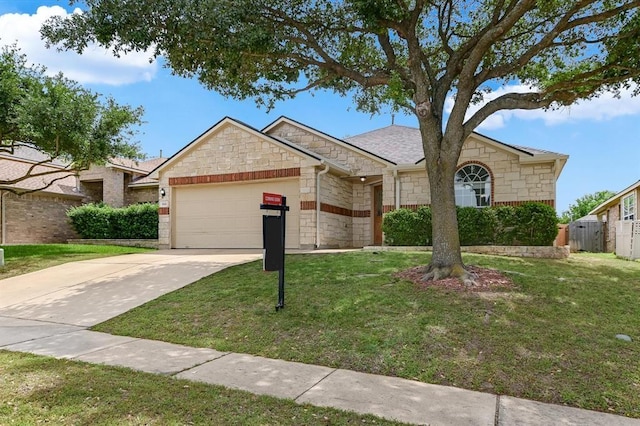 1901 Rachel Ln, Round Rock, TX 78664 - single story home with stone siding, a garage, and concrete driveway