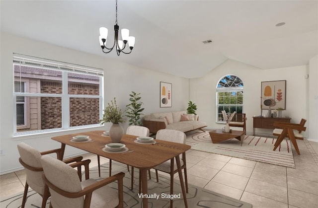 1901 Rachel Ln, Round Rock, TX 78664 - dining room featuring light tile patterned floors, lofted ceiling, and a chandelier