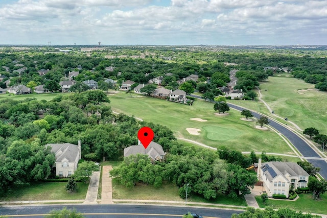 3803 Bobby Jones Way, Round Rock, TX 78664 - aerial perspective of suburban area with a golf course and a tree filled landscape