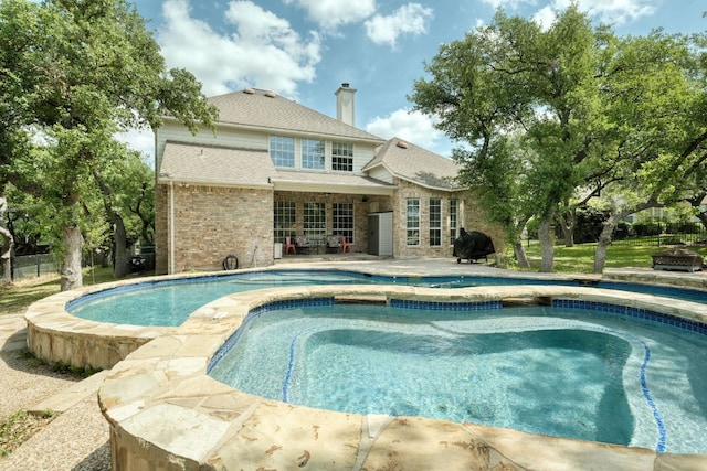 3803 Bobby Jones Way, Round Rock, TX 78664 - outdoor pool with a patio and area for grilling