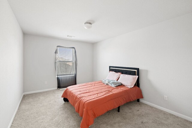 17717 Zinfandel Dr, Pflugerville, TX 78660 - carpeted bedroom featuring baseboards