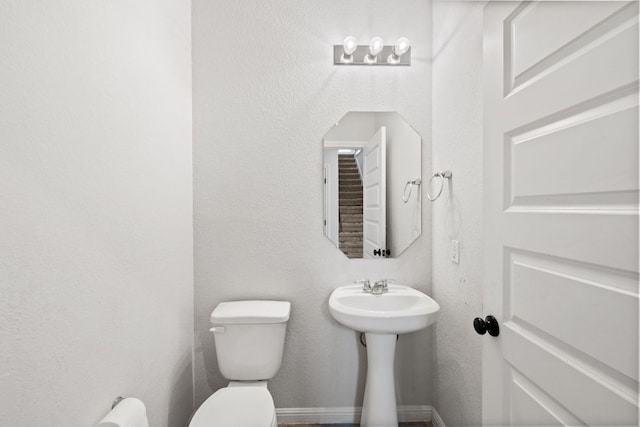 17717 Zinfandel Dr, Pflugerville, TX 78660 - half bath featuring a sink and toilet