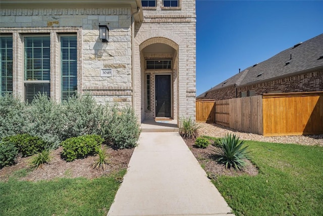 3049 Sage Ranch Dr, Leander, TX 78641 - property entrance with stone siding and brick siding
