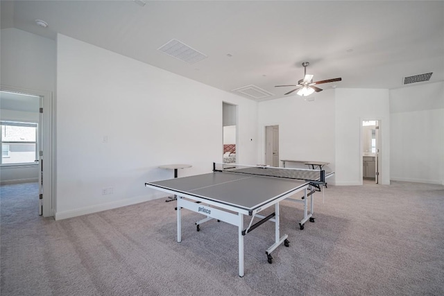 3049 Sage Ranch Dr, Leander, TX 78641 - game room featuring light carpet, a ceiling fan, lofted ceiling, and attic access