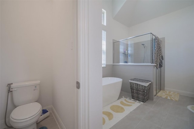 3049 Sage Ranch Dr, Leander, TX 78641 - full bathroom featuring a freestanding tub, a shower stall, and tile patterned flooring