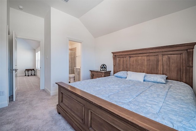 3049 Sage Ranch Dr, Leander, TX 78641 - bedroom featuring vaulted ceiling, light carpet, and connected bathroom