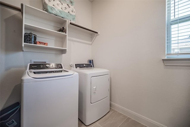 3049 Sage Ranch Dr, Leander, TX 78641 - laundry room featuring independent washer and dryer and light marble finish floors