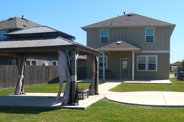10516 Alemoor Dr, Austin, TX 78747 - rear view of property with a gazebo, board and batten siding, a patio area, and roof with shingles