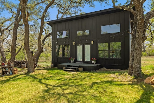 view of outbuilding featuring french doors