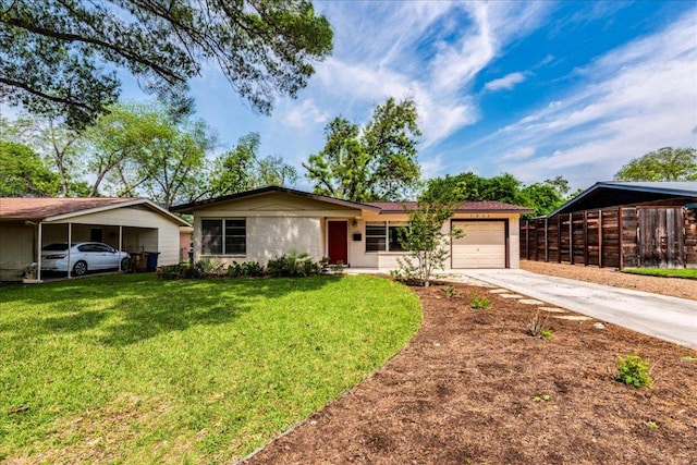ranch-style home featuring concrete driveway, a carport, an attached garage, fence, and a front yard