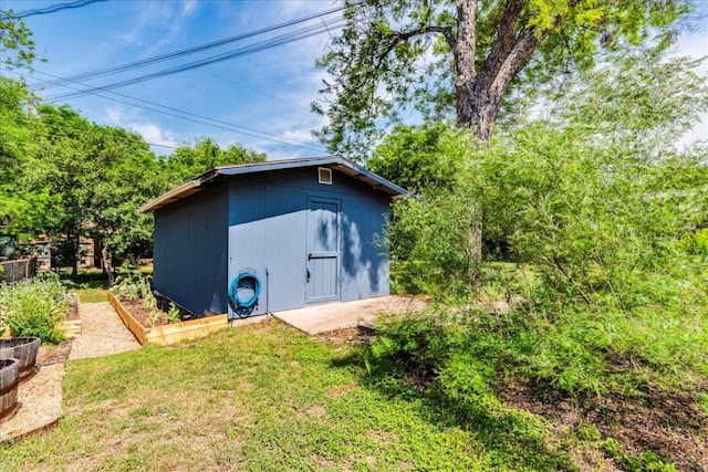 view of shed featuring a garden