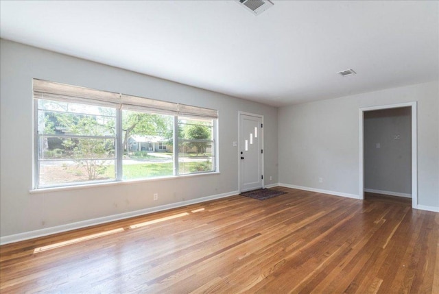 7802 Tisdale Dr, Austin, TX 78757 - foyer entrance featuring wood finished floors and baseboards