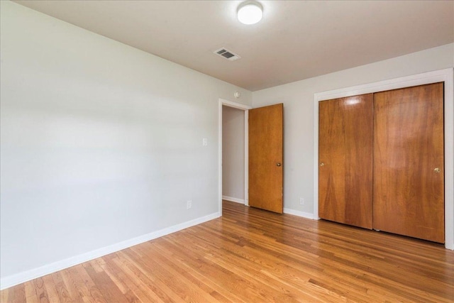 7802 Tisdale Dr, Austin, TX 78757 - unfurnished bedroom with light wood-style floors and a closet