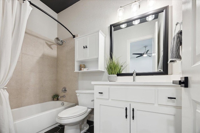 bathroom with tile patterned floors, toilet, vanity, shower / tub combo, and ceiling fan