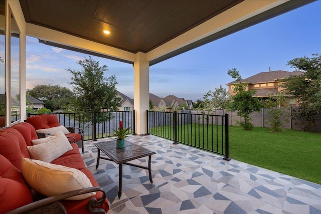 view of patio / terrace featuring fence and an outdoor hangout area