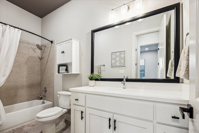 bathroom featuring shower / tub combo, toilet, and vanity