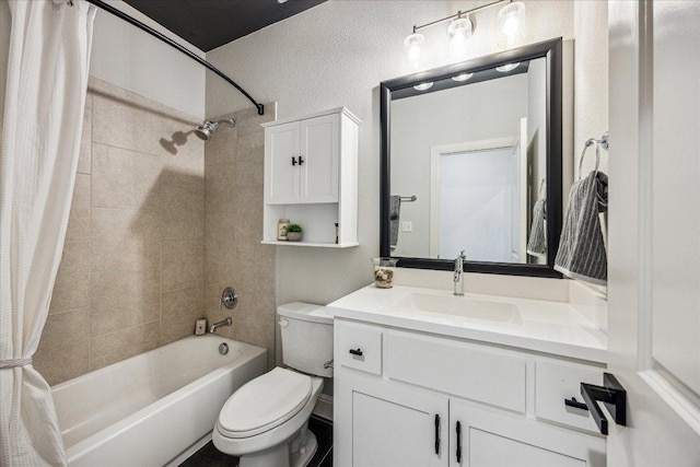 full bathroom with shower / bath combo, vanity, and toilet