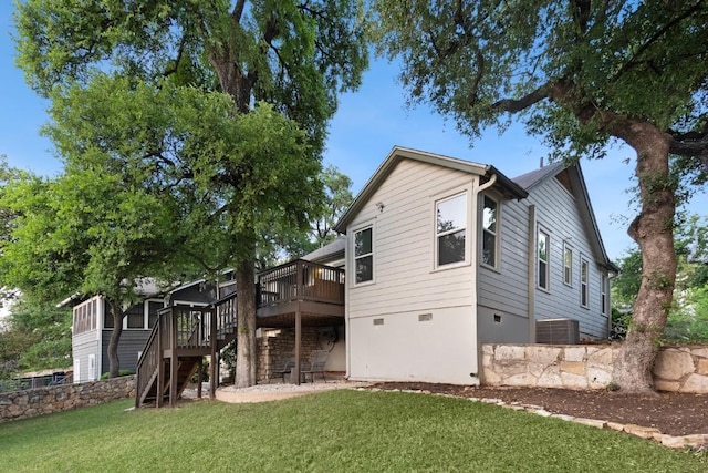 2844 Shoal Crest Ave, Austin, TX 78705 - rear view of property with a yard, central AC, stairway, and a deck