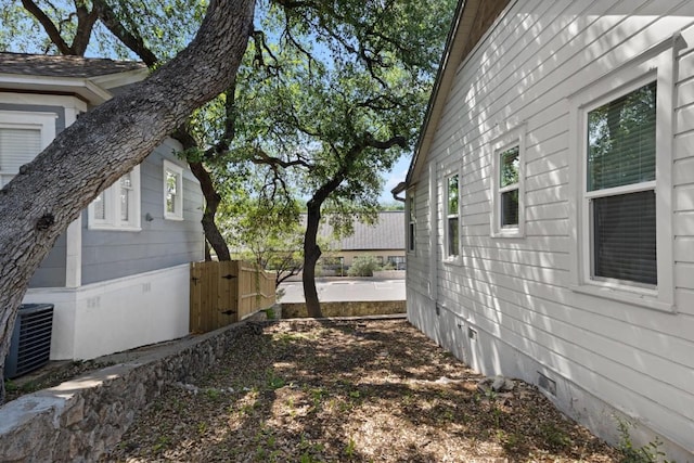 2844 Shoal Crest Ave, Austin, TX 78705 - view of side of property with a gate, central air condition unit, crawl space, and fence