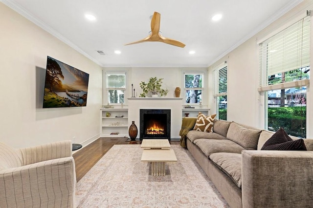 2844 Shoal Crest Ave, Austin, TX 78705 - living area with recessed lighting, wood finished floors, visible vents, and crown molding