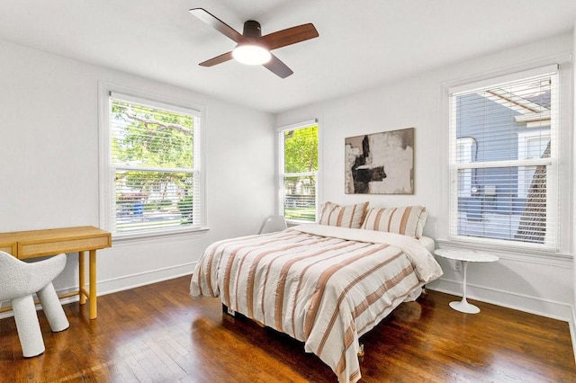 2844 Shoal Crest Ave, Austin, TX 78705 - bedroom with wood finished floors, baseboards, and ceiling fan