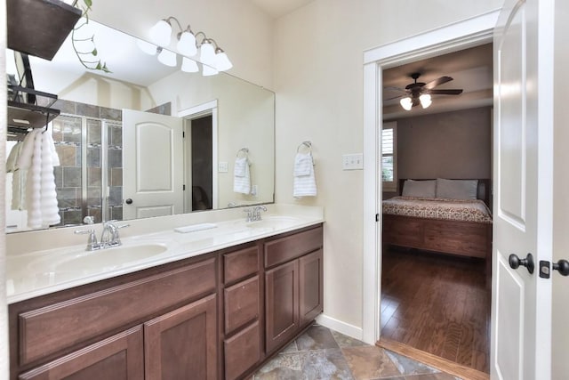 110 Chestnut Ct, Georgetown, TX 78633 - full bathroom featuring ensuite bath, double vanity, a shower stall, and a ceiling fan
