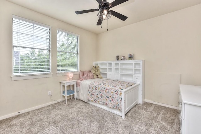 110 Chestnut Ct, Georgetown, TX 78633 - bedroom with light colored carpet, baseboards, and a ceiling fan