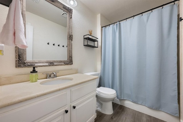 3403 NW Blvd, Georgetown, TX 78628 - full bath with wood finished floors, vanity, and shower / bathtub combination with curtain