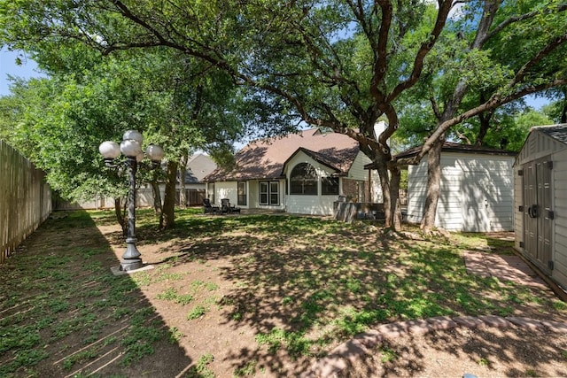 3403 NW Blvd, Georgetown, TX 78628 - fenced backyard featuring a storage unit