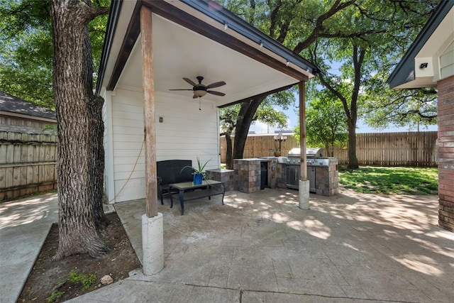 3403 NW Blvd, Georgetown, TX 78628 - fenced backyard with ceiling fan, a patio area, and area for grilling