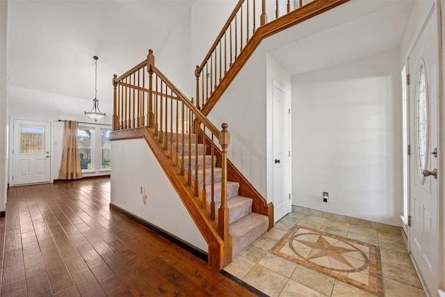 3403 NW Blvd, Georgetown, TX 78628 - entrance foyer with stairway, high vaulted ceiling, and wood finished floors