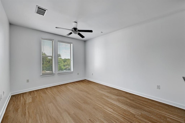 1900 Barton Springs Rd Unit 4023, Austin, TX 78704 - spare room featuring wood finished floors and a ceiling fan