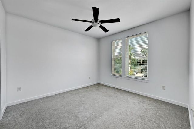 1900 Barton Springs Rd Unit 4023, Austin, TX 78704 - carpeted spare room featuring baseboards and a ceiling fan