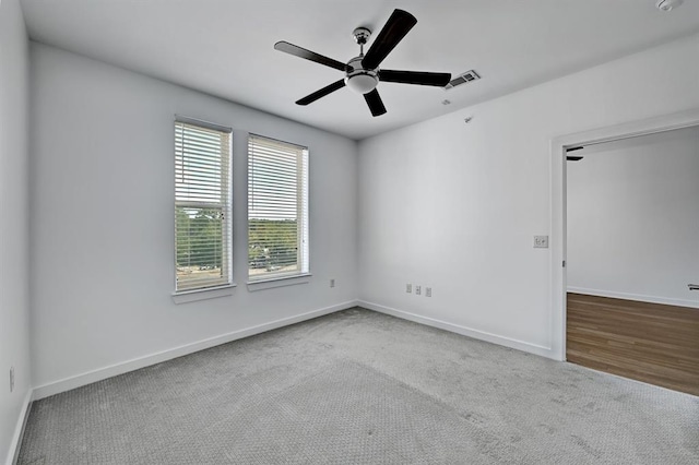 1900 Barton Springs Rd Unit 4023, Austin, TX 78704 - unfurnished room with carpet flooring, a ceiling fan, and a smoke detector