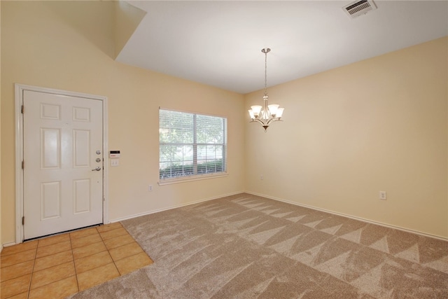 10916 Furrow Hill Dr, Austin, TX 78754 - tiled entrance foyer featuring carpet flooring and a chandelier