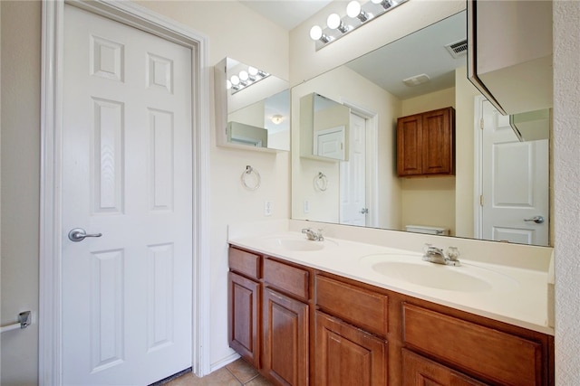10916 Furrow Hill Dr, Austin, TX 78754 - bathroom featuring double vanity and tile patterned flooring