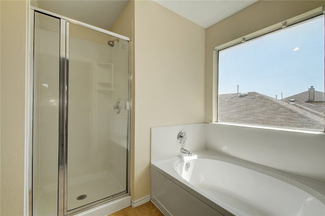 10916 Furrow Hill Dr, Austin, TX 78754 - full bathroom with a stall shower and a garden tub