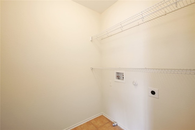 10916 Furrow Hill Dr, Austin, TX 78754 - laundry area featuring hookup for a gas dryer, hookup for an electric dryer, hookup for a washing machine, and light tile patterned floors