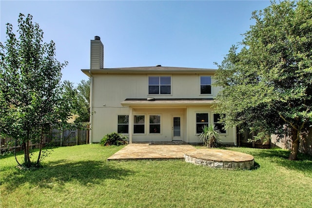 10916 Furrow Hill Dr, Austin, TX 78754 - back of house with a fenced backyard, a patio area, and a chimney