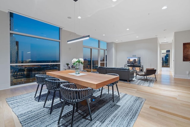 555 E 5th St Unit 2729, Austin, TX 78701 - dining area featuring wood finished floors and recessed lighting