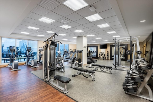 555 E 5th St Unit 2729, Austin, TX 78701 - workout area with wood finished floors and a paneled ceiling