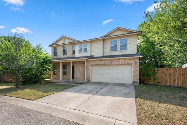 view of front of home featuring fence, concrete driveway, covered porch, a front yard, and a garage