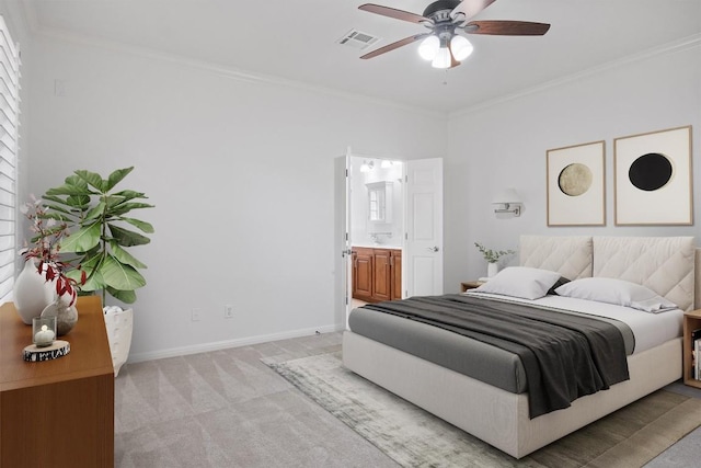 bedroom featuring visible vents, ornamental molding, connected bathroom, baseboards, and light colored carpet