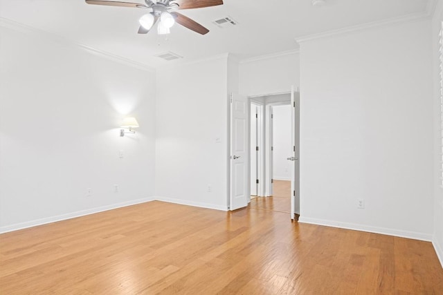 6425 Tasajillo Trl, Austin, TX 78739 - empty room featuring ceiling fan, ornamental molding, light wood-style floors, and baseboards
