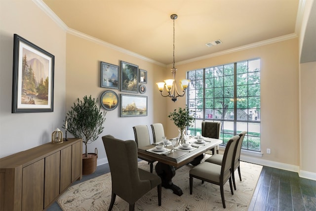 308 Angus Dr, Cedar Park, TX 78613 - dining room featuring crown molding, a chandelier, wood finished floors, and baseboards